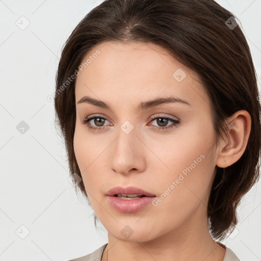 Neutral white young-adult female with medium  brown hair and brown eyes