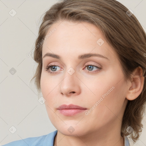 Neutral white young-adult female with medium  brown hair and grey eyes