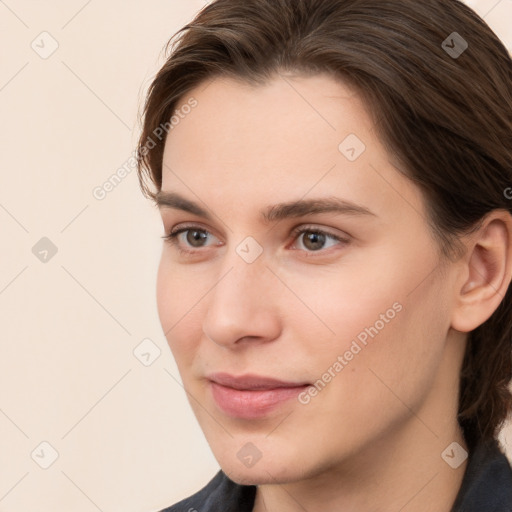 Neutral white young-adult female with medium  brown hair and brown eyes