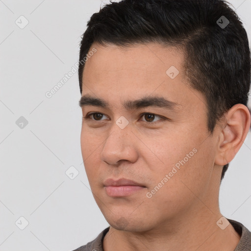 Neutral latino young-adult male with short  black hair and brown eyes