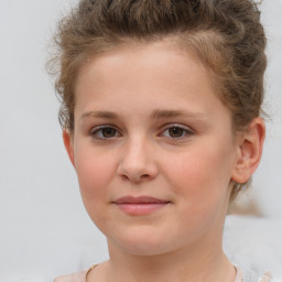 Joyful white child female with short  brown hair and brown eyes