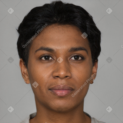 Joyful black young-adult female with short  black hair and brown eyes