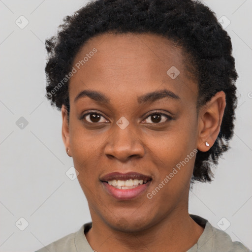 Joyful black young-adult female with short  black hair and brown eyes