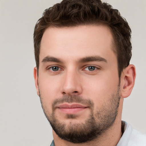 Neutral white young-adult male with short  brown hair and brown eyes