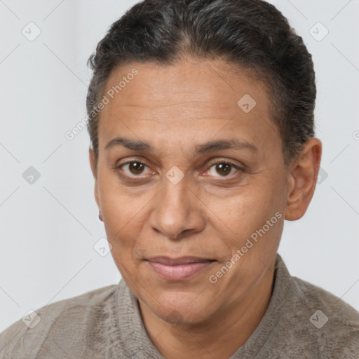 Joyful white adult female with short  brown hair and brown eyes