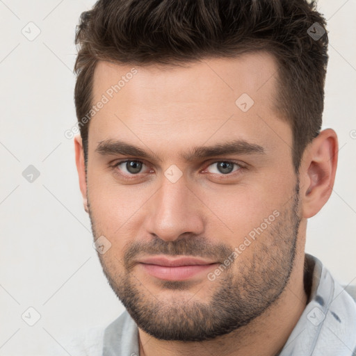 Neutral white young-adult male with short  brown hair and brown eyes