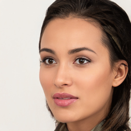 Neutral white young-adult female with long  brown hair and brown eyes