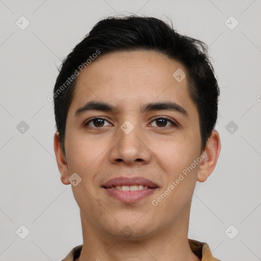 Joyful latino young-adult male with short  black hair and brown eyes