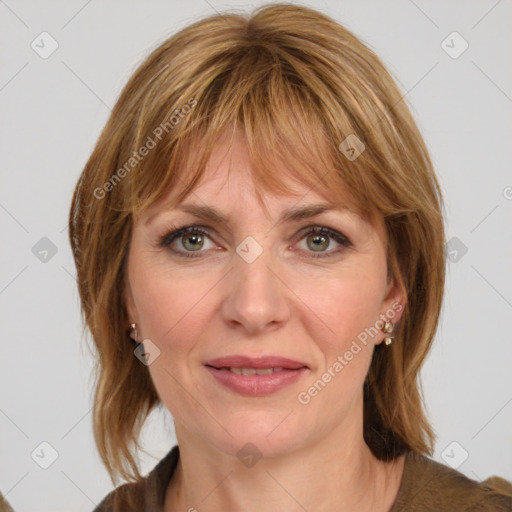 Joyful white adult female with medium  brown hair and grey eyes