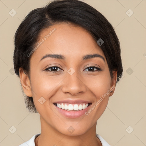 Joyful latino young-adult female with short  brown hair and brown eyes