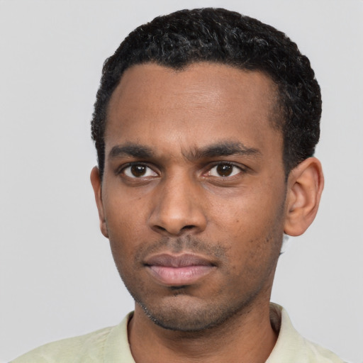 Neutral black young-adult male with short  black hair and brown eyes