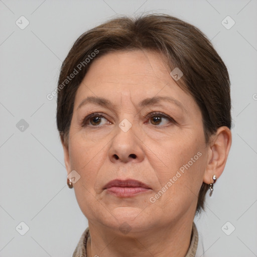 Joyful white adult female with short  brown hair and brown eyes