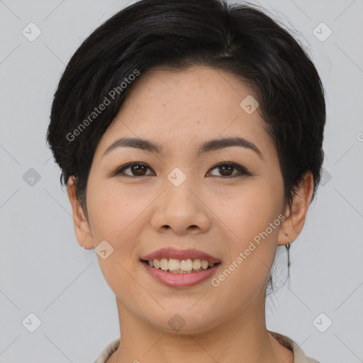 Joyful asian young-adult female with short  brown hair and brown eyes