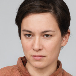 Neutral white young-adult female with short  brown hair and brown eyes