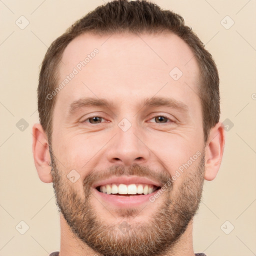 Joyful white young-adult male with short  brown hair and brown eyes