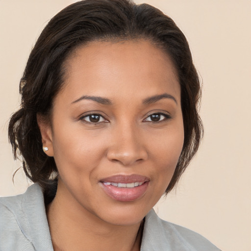 Joyful white young-adult female with medium  brown hair and brown eyes