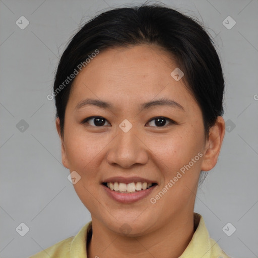 Joyful asian young-adult female with short  brown hair and brown eyes