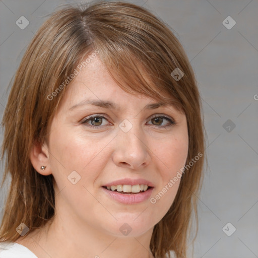 Joyful white young-adult female with medium  brown hair and blue eyes