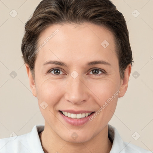 Joyful white young-adult female with short  brown hair and brown eyes