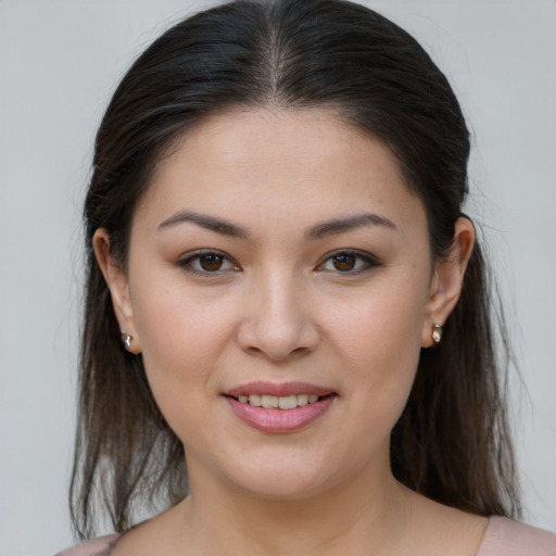 Joyful white young-adult female with medium  brown hair and brown eyes