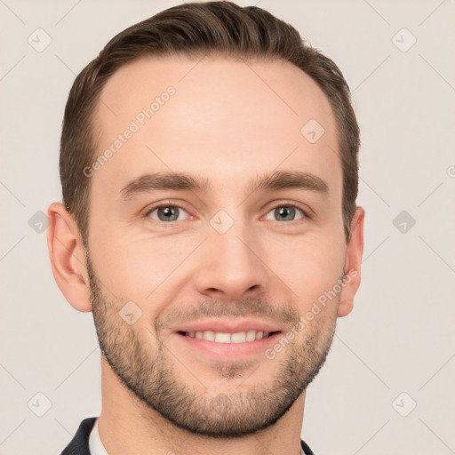 Joyful white young-adult male with short  brown hair and brown eyes