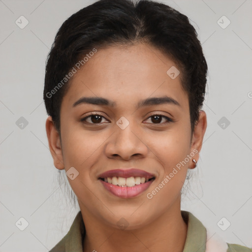 Joyful latino young-adult female with short  brown hair and brown eyes