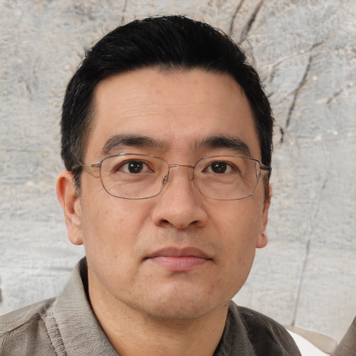 Neutral white adult male with short  black hair and brown eyes