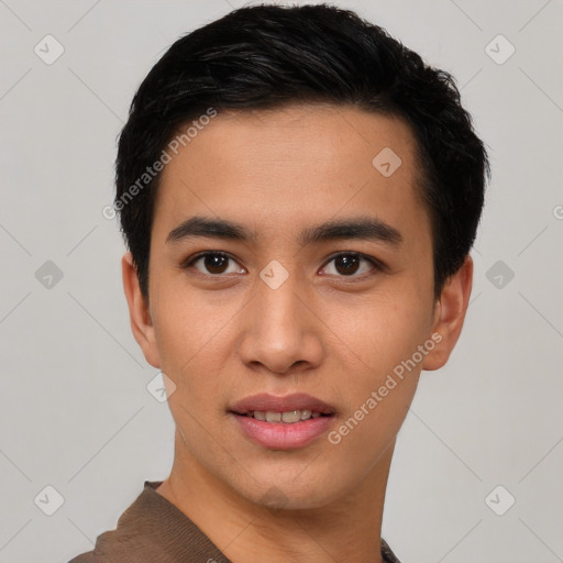 Joyful asian young-adult male with short  black hair and brown eyes