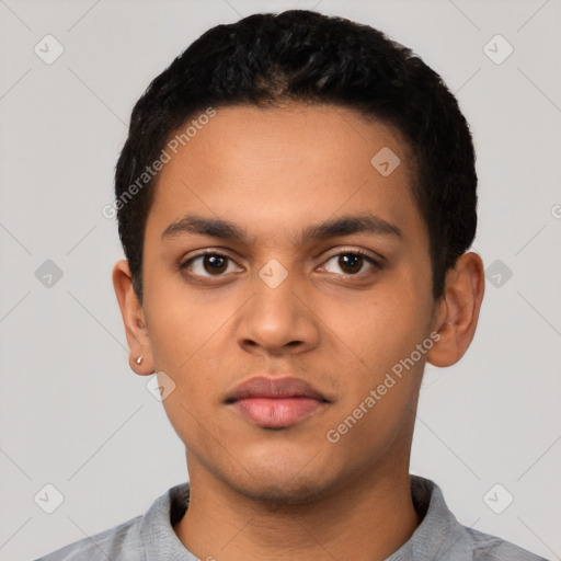 Neutral latino young-adult male with short  black hair and brown eyes