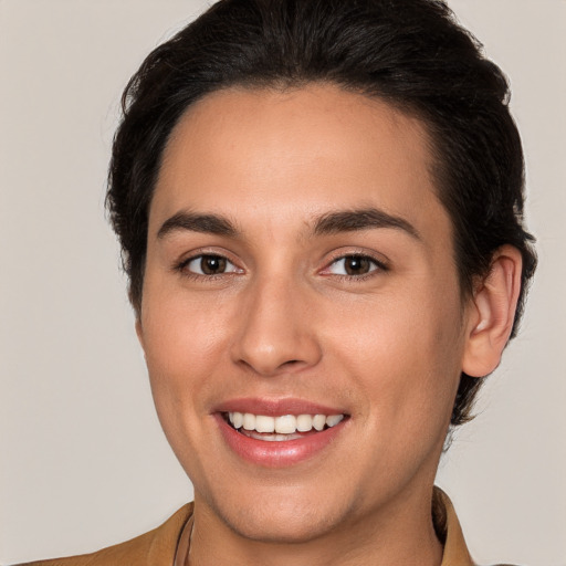 Joyful white young-adult female with short  brown hair and brown eyes