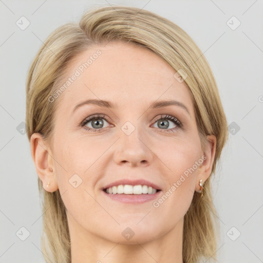 Joyful white young-adult female with long  brown hair and blue eyes