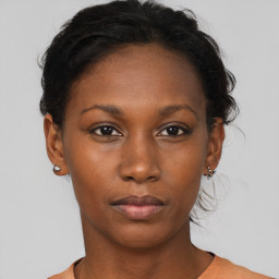 Neutral black young-adult female with short  brown hair and brown eyes