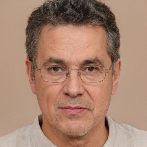 Joyful white middle-aged male with short  brown hair and brown eyes