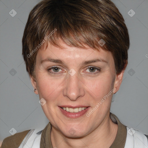 Joyful white adult female with medium  brown hair and grey eyes