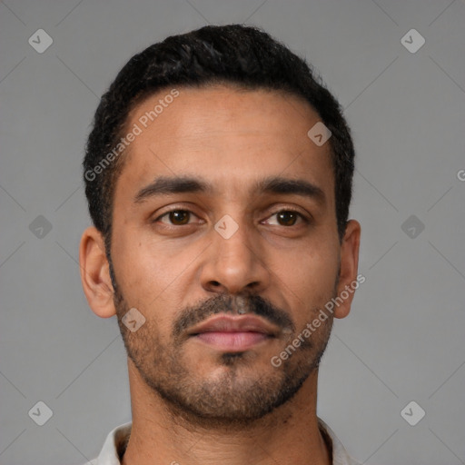 Neutral latino young-adult male with short  black hair and brown eyes