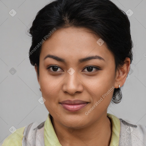 Joyful latino young-adult female with medium  brown hair and brown eyes