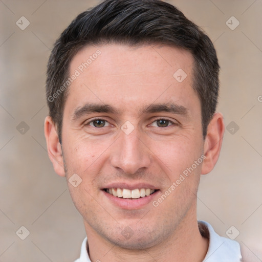 Joyful white young-adult male with short  brown hair and brown eyes