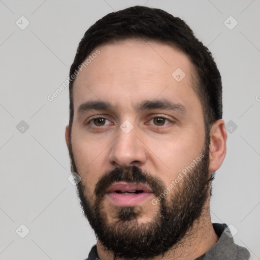 Neutral white young-adult male with short  black hair and brown eyes