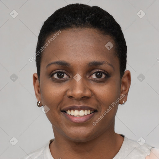 Joyful black young-adult female with short  black hair and brown eyes