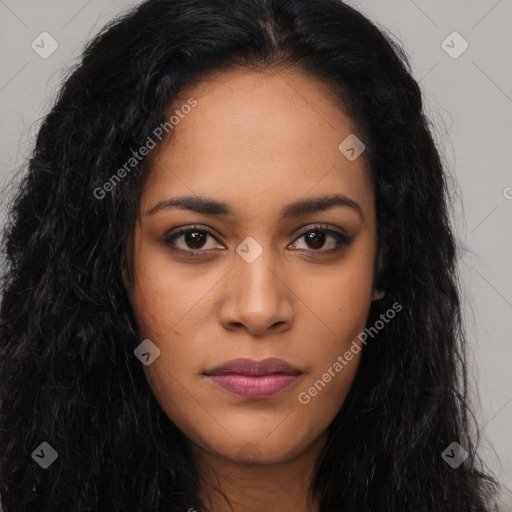 Joyful latino young-adult female with long  black hair and brown eyes