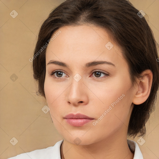 Neutral white young-adult female with medium  brown hair and brown eyes