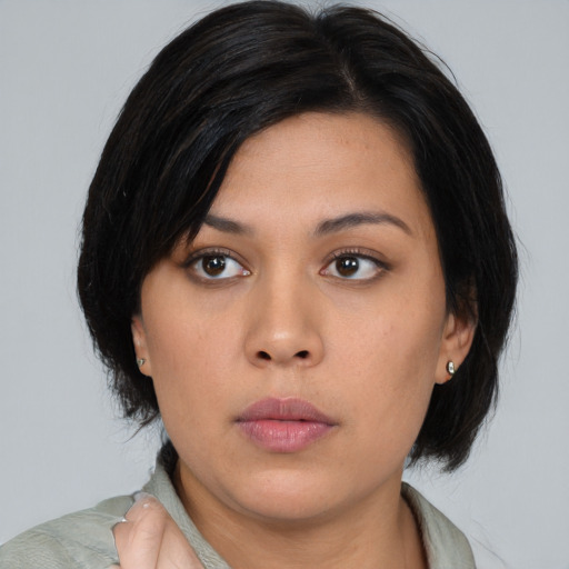 Neutral asian young-adult female with medium  black hair and brown eyes