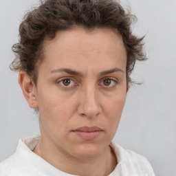 Neutral white adult female with short  brown hair and brown eyes