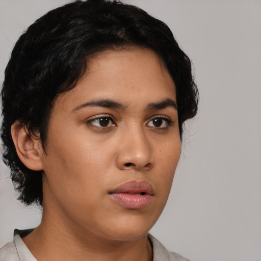 Neutral latino young-adult female with medium  black hair and brown eyes