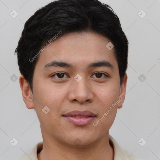 Joyful asian young-adult male with short  brown hair and brown eyes