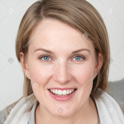 Joyful white young-adult female with medium  brown hair and blue eyes