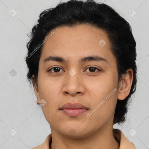 Joyful latino young-adult female with short  brown hair and brown eyes