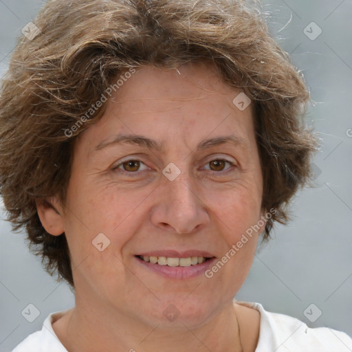 Joyful white adult female with short  brown hair and brown eyes