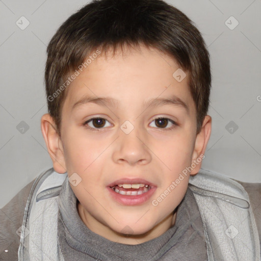 Joyful white child male with short  brown hair and brown eyes