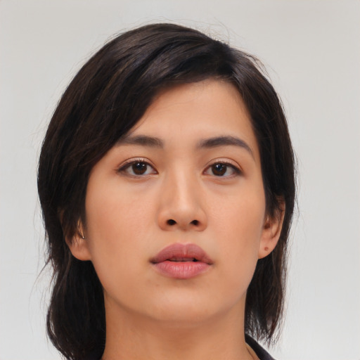Neutral asian young-adult female with medium  brown hair and brown eyes